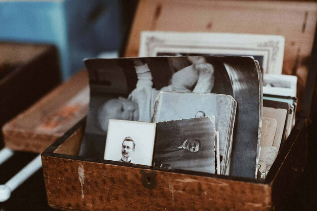 wooden box filled with grey and white picture