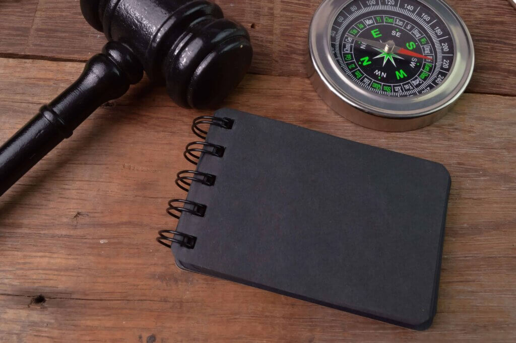 judge-gavel-compass-notebook-written-with-law-justice