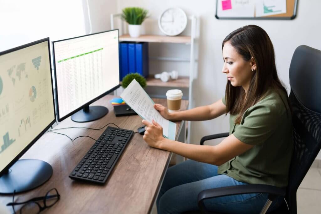 Freelance woman reading a work contract