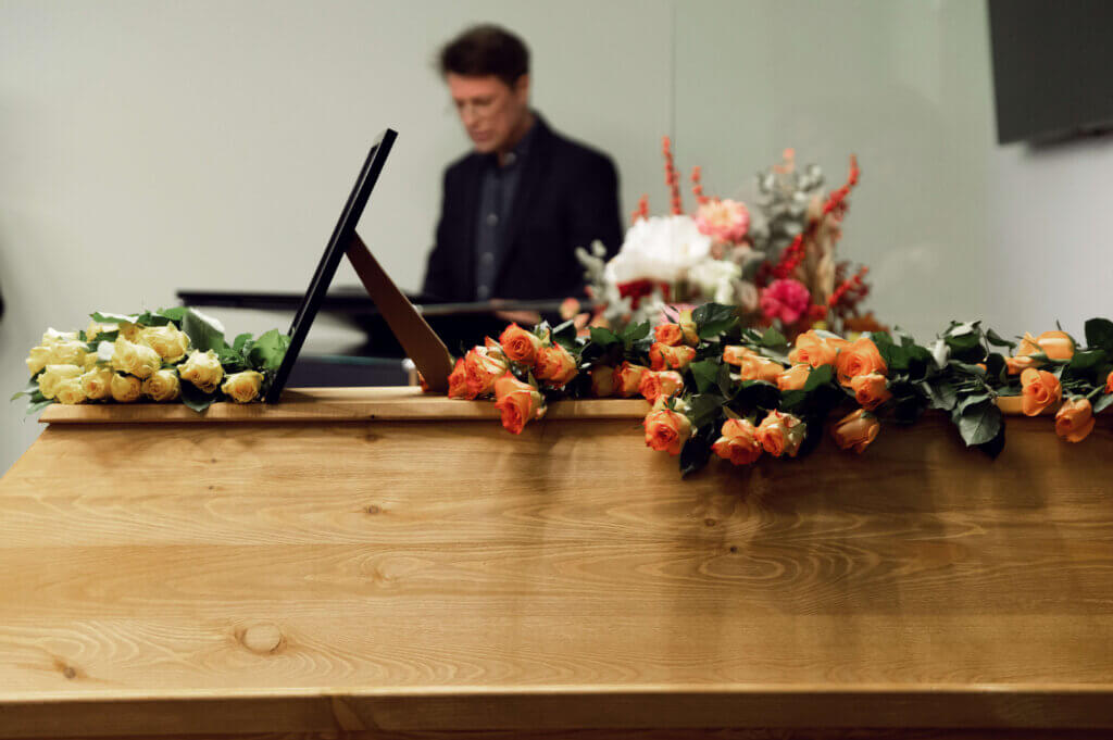 funeral ceremony funeral home director is looking trough documents