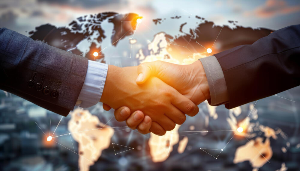 two businessmen shake hands two businessmen shake hands